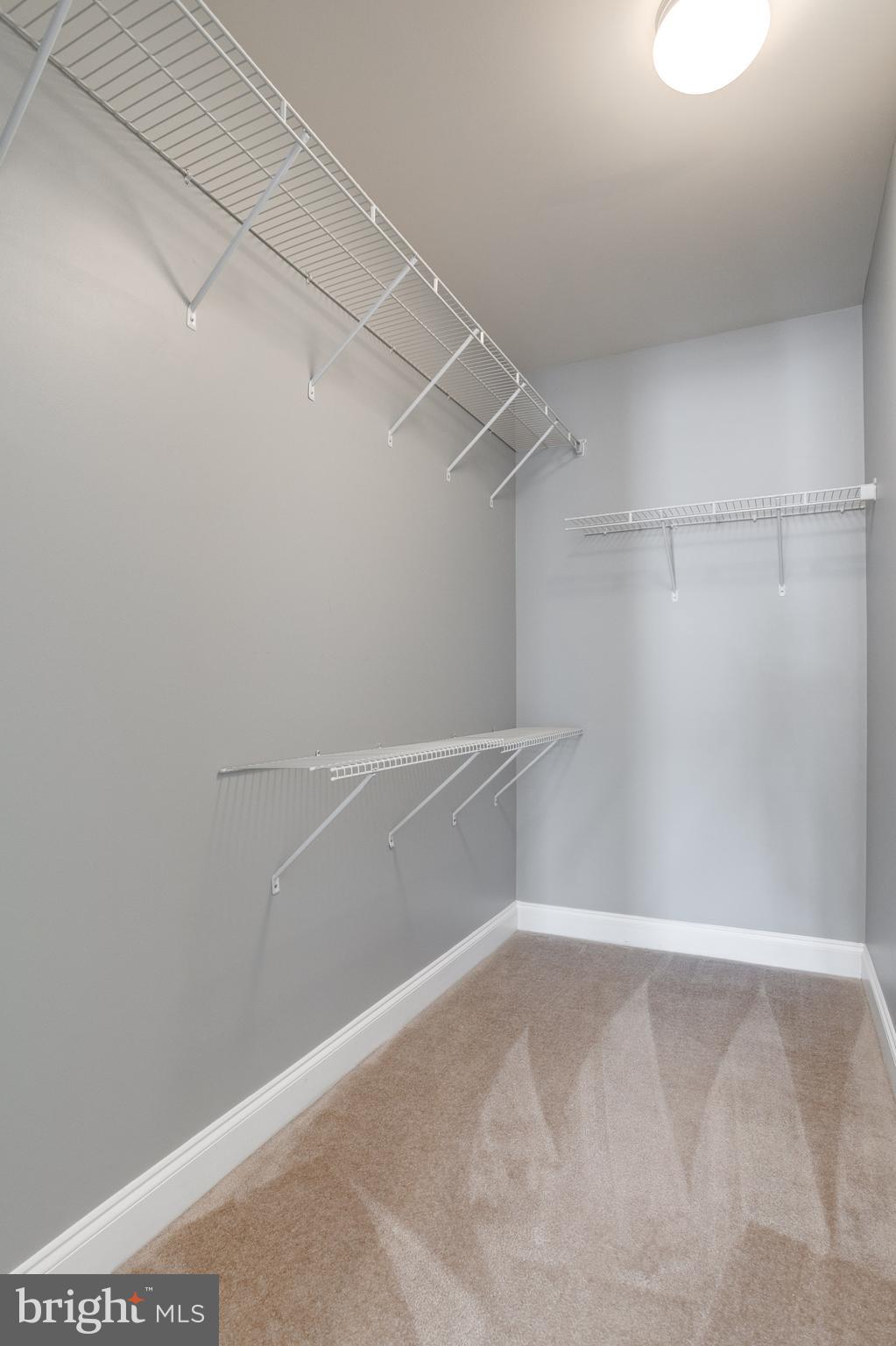 18475 Kerill Road Triangle, VA 22172 - Photo 84 of 99 a view of a room with racks on the wall