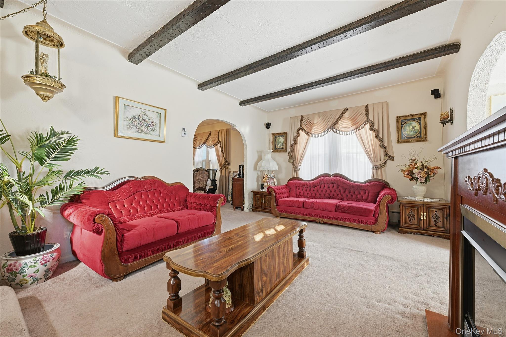89-18 239th Street Queens, NY 11426 - Photo 2 of 14 a living room with furniture