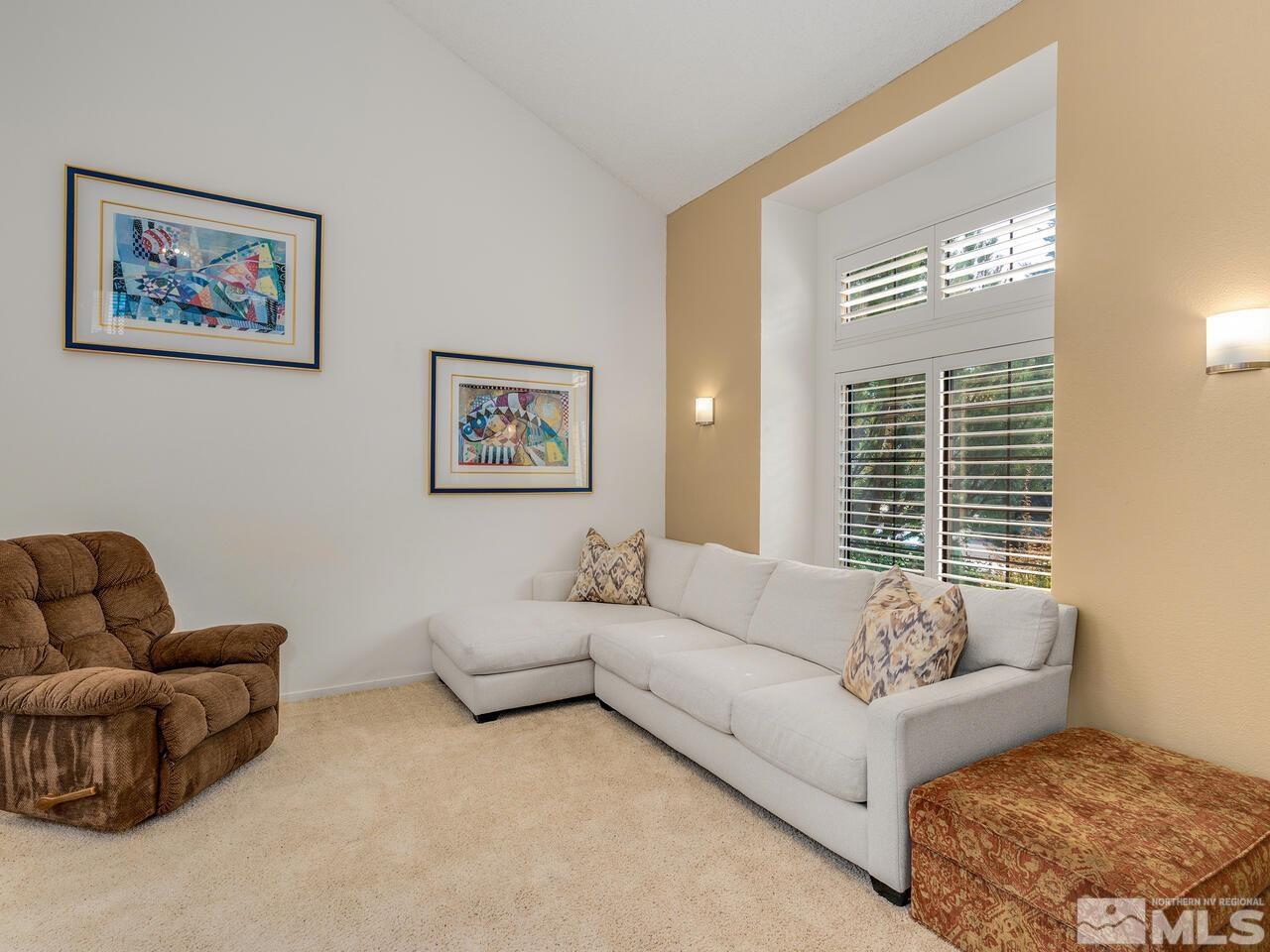 1722 Rainbow Ridge Road Reno, NV 89523 - Photo 5 of 27 a living room with furniture and a large window