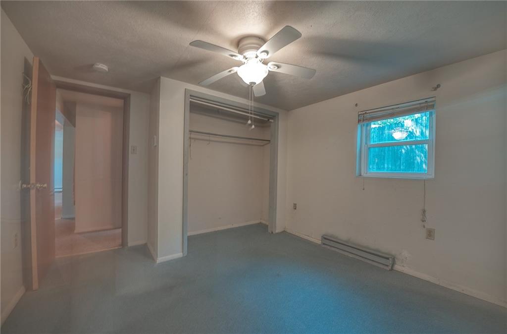 296 East Pike Road Indiana, PA 15701 - Photo 26 of 46 an empty room with windows and fan