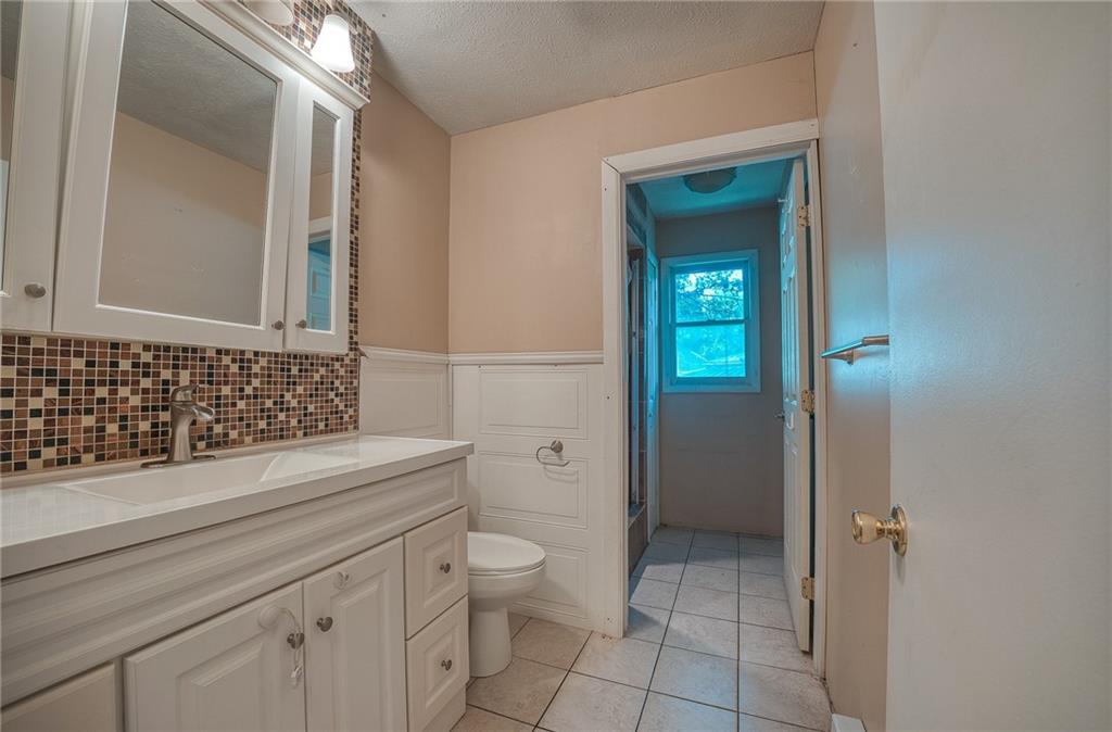 296 East Pike Road Indiana, PA 15701 - Photo 8 of 46 a bathroom with a sink a toilet and shower
