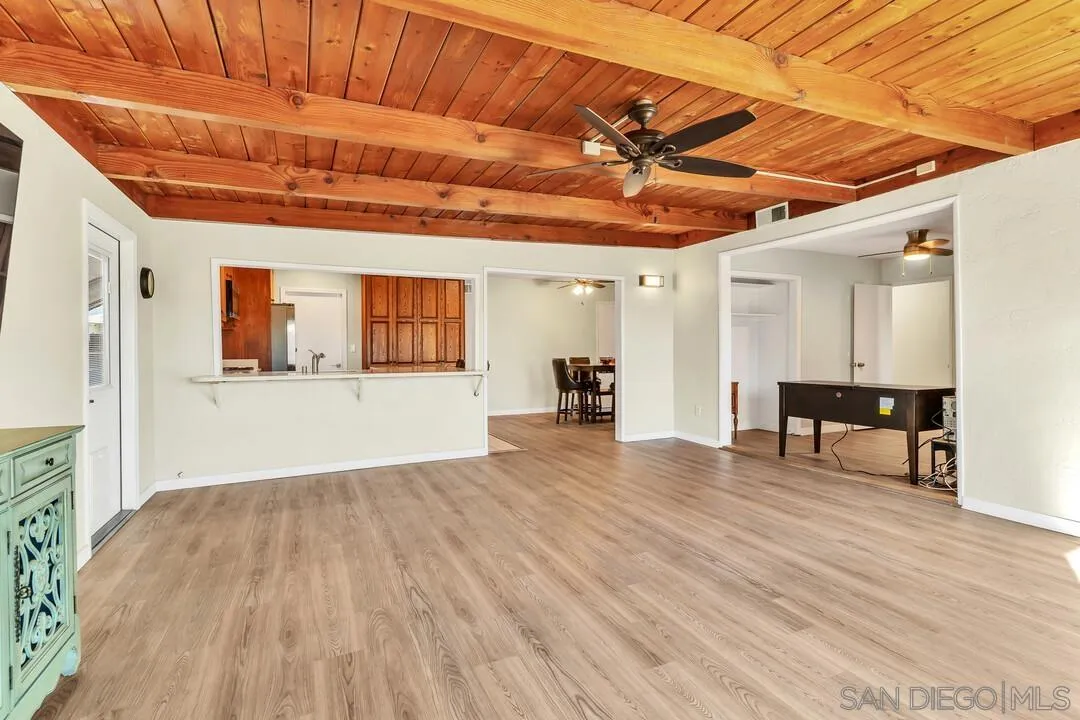 10143 Maple Tree Road Santee, CA 92071 - Photo 15 of 43 a view of a room with wooden floor and a sink