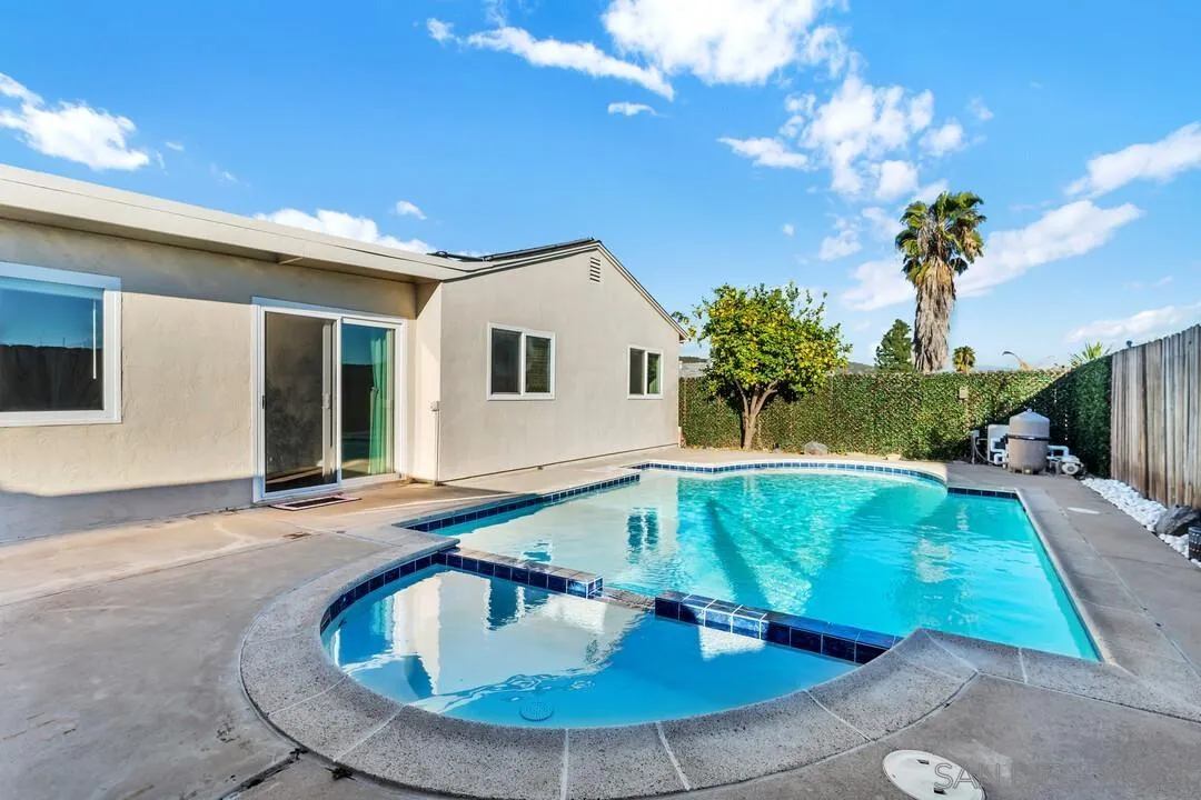 10143 Maple Tree Road Santee, CA 92071 - Photo 28 of 43 a view of a house with swimming pool