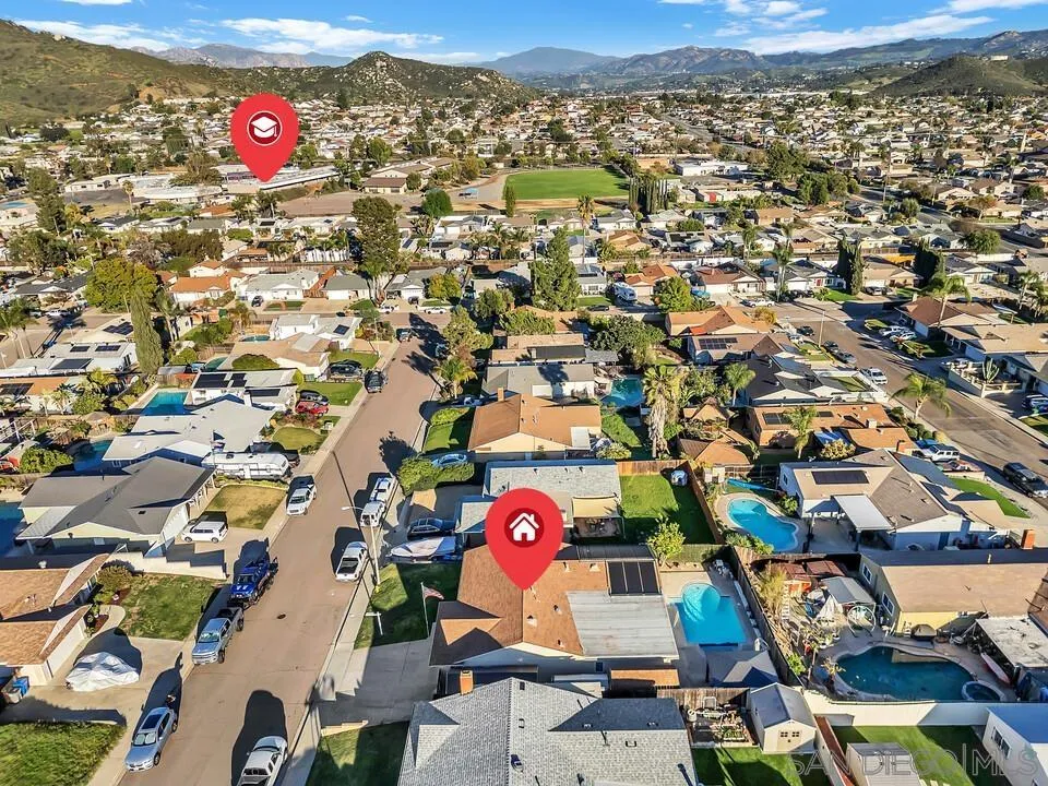 10143 Maple Tree Road Santee, CA 92071 - Photo 39 of 43 an aerial view of residential houses with outdoor space