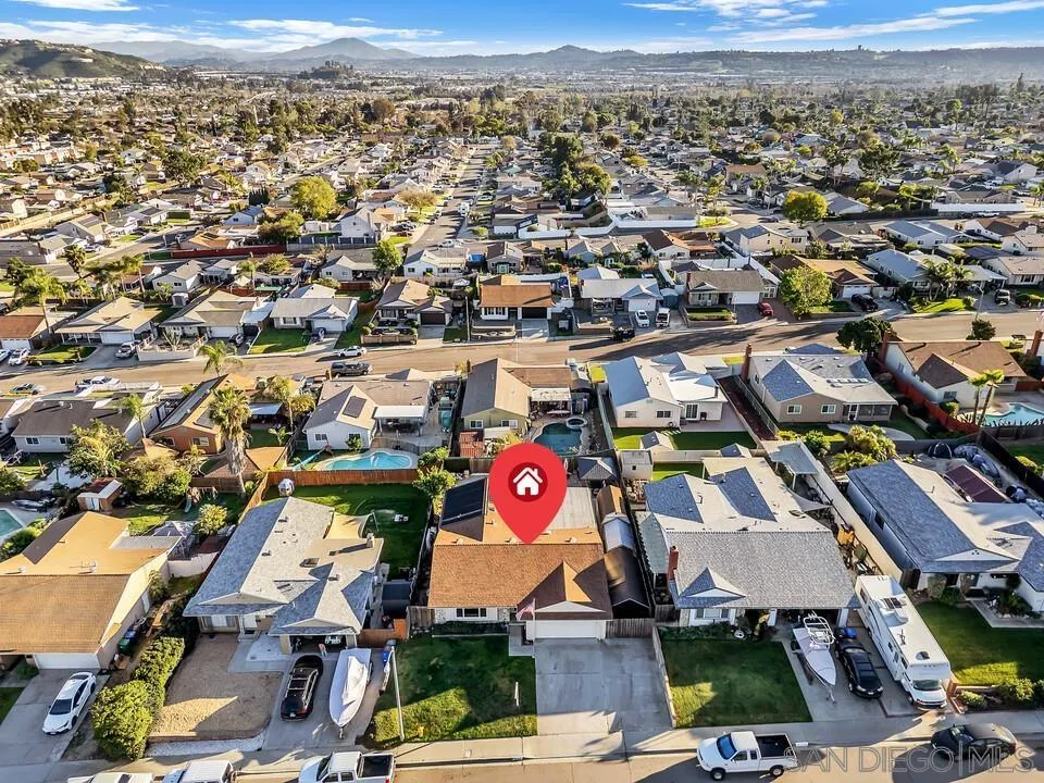 10143 Maple Tree Road Santee, CA 92071 - Photo 40 of 43 an aerial view of a city with streets and houses