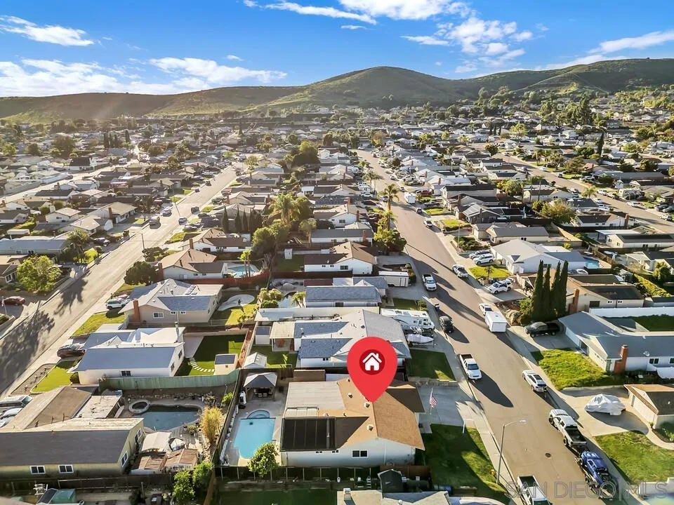 10143 Maple Tree Road Santee, CA 92071 - Photo 41 of 43 an aerial view of residential houses with outdoor space