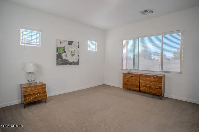 a room with furniture and a window