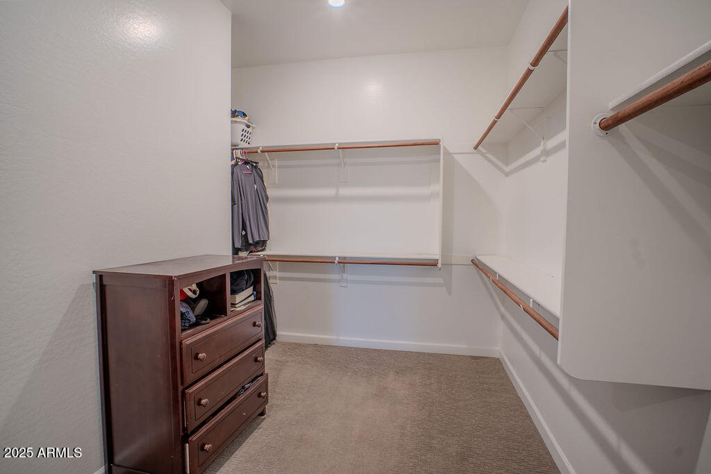 16979 West Alameda Road Surprise, AZ 85387 - Photo 15 of 33 a view of an empty walk in closet