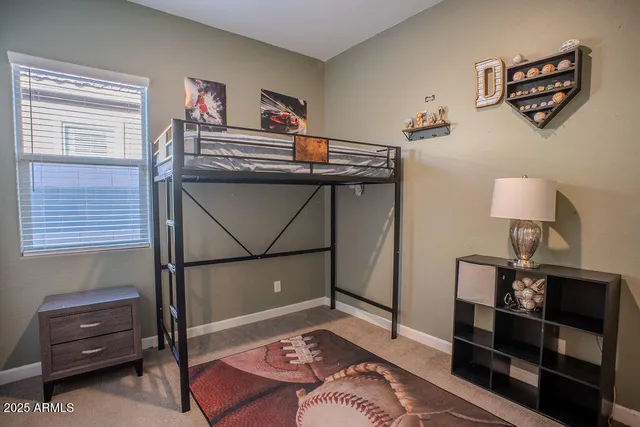 a bedroom with a bed and a closet