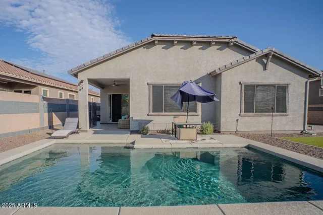 a view of house with chair and tables