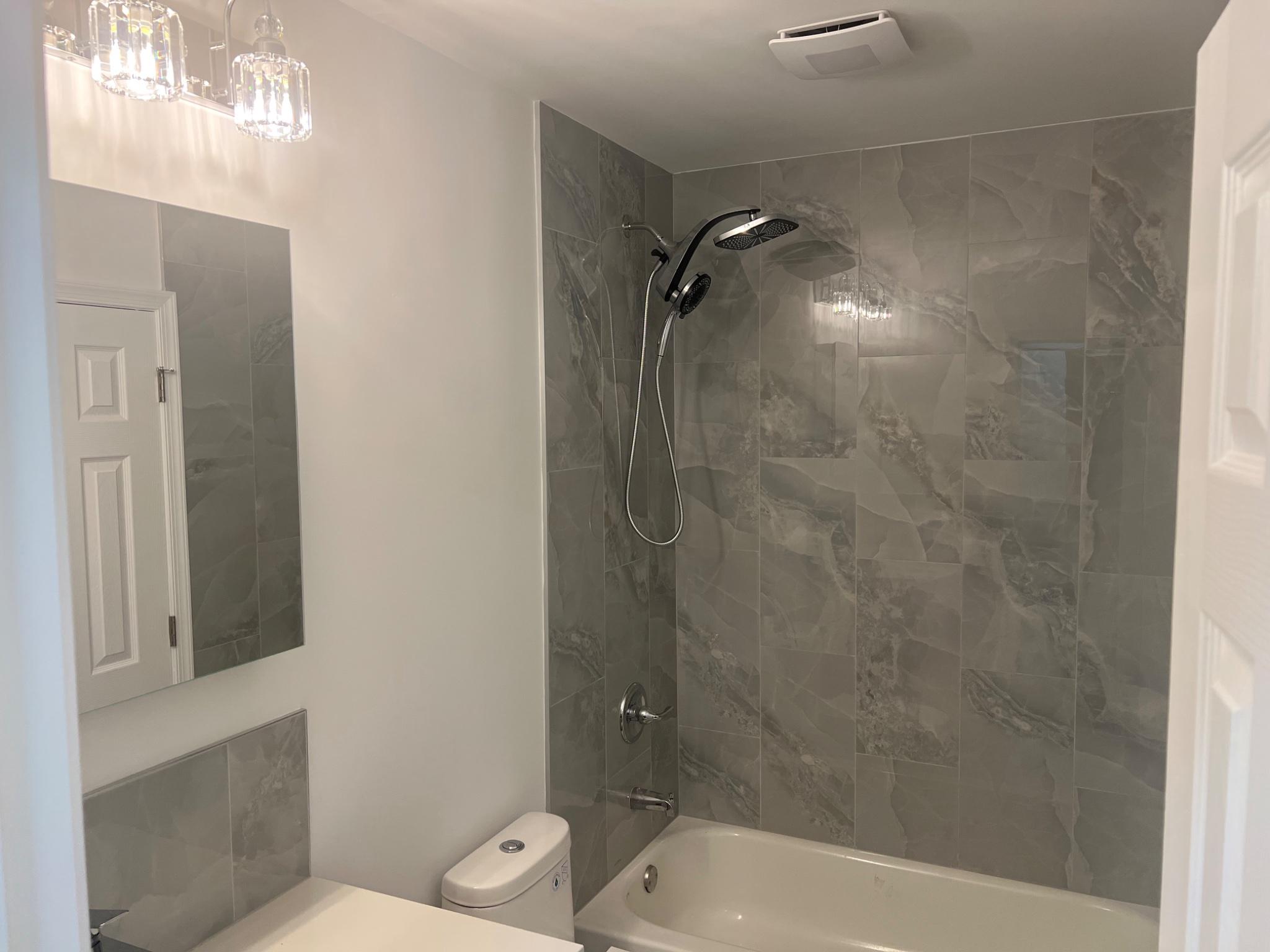 8425 Ridgeway Street Philadelphia, PA 19111 - Photo 12 of 22 Main bathroom with elegant tiles on main level