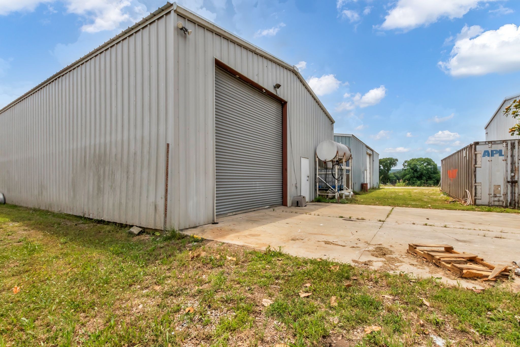 184 Buncombe Road Belvidere, TN 37306 - Photo 8 of 17 a view of a house with a yard and garage