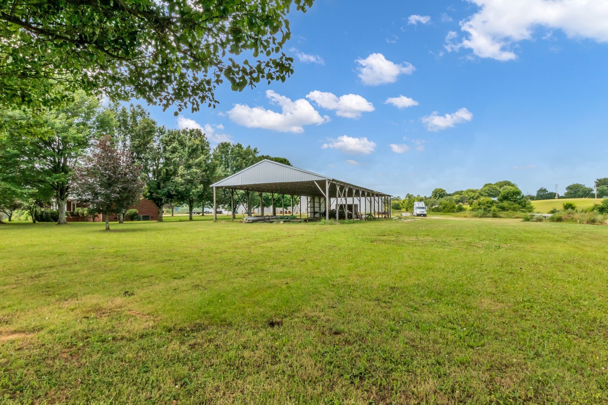 184 Buncombe Road Belvidere, TN 37306 - Photo 10 of 17 a view of a house with a big yard