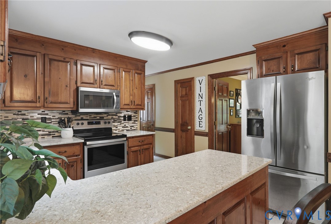 13232 Singer Road Midlothian, VA 23112 - Photo 12 of 44 The kitchen offers ample storage space and not one