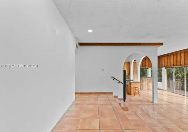 a view of a hallway with entryway