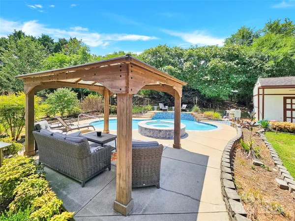 a view of outdoor space yard swimming pool and patio