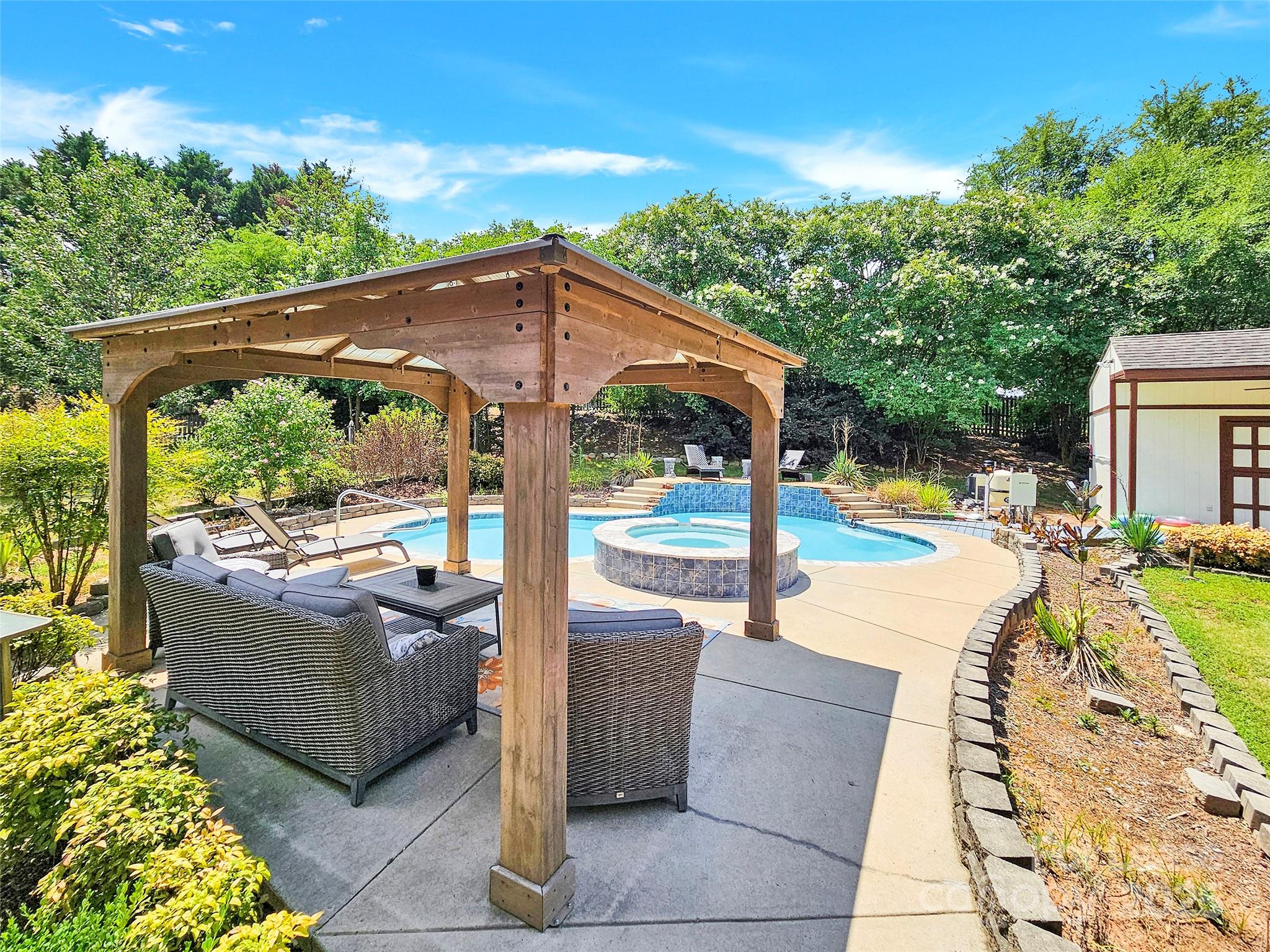 8534 Headford Road Charlotte, NC 28277 - Photo 11 of 48 a view of outdoor space yard swimming pool and patio