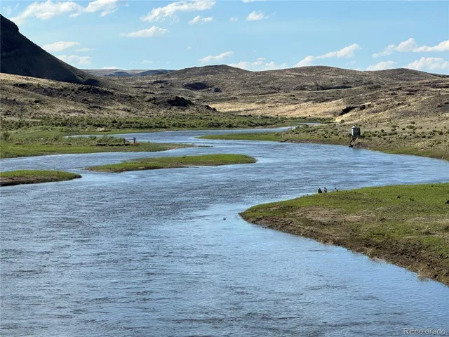 a view of a lake with an outdoor space