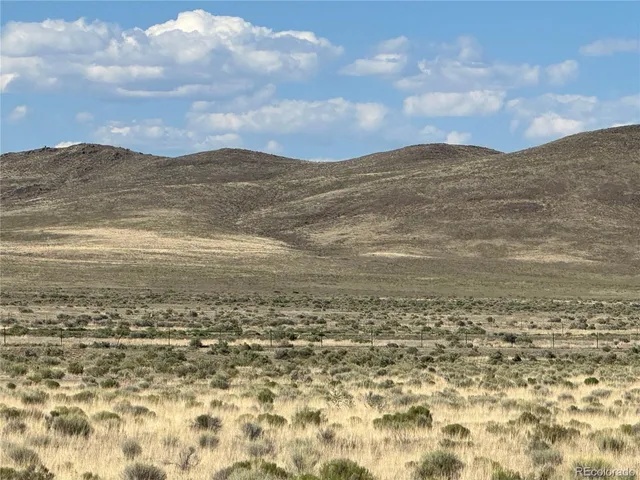 a view of ocean and mountain