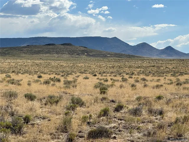 a view of lake with mountain