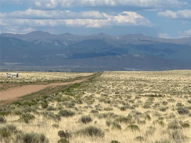 a view of a backyard with a mountain