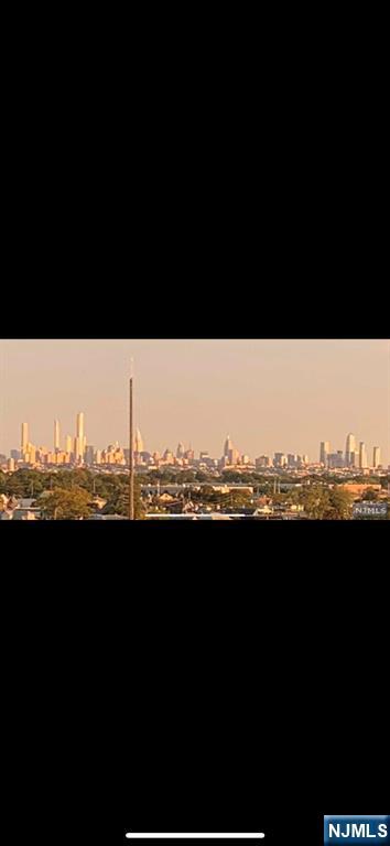 54 Polifly Road, Unit 506 Hackensack, NJ 07601 - Photo 2 of 3 a view of a sky from a terrace