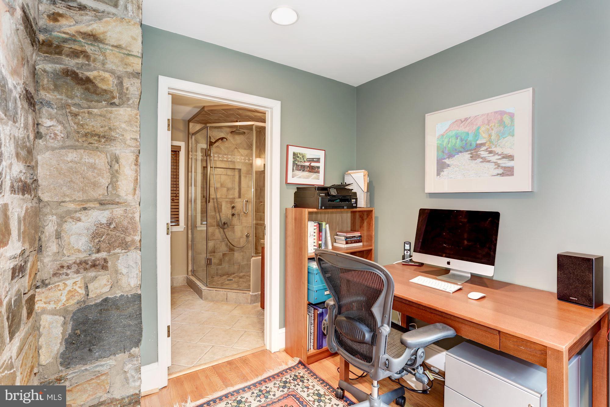 2706 Ridge Rd Drive Alexandria, VA 22302 - Photo 12 of 30 a view of a workspace with furniture and a window