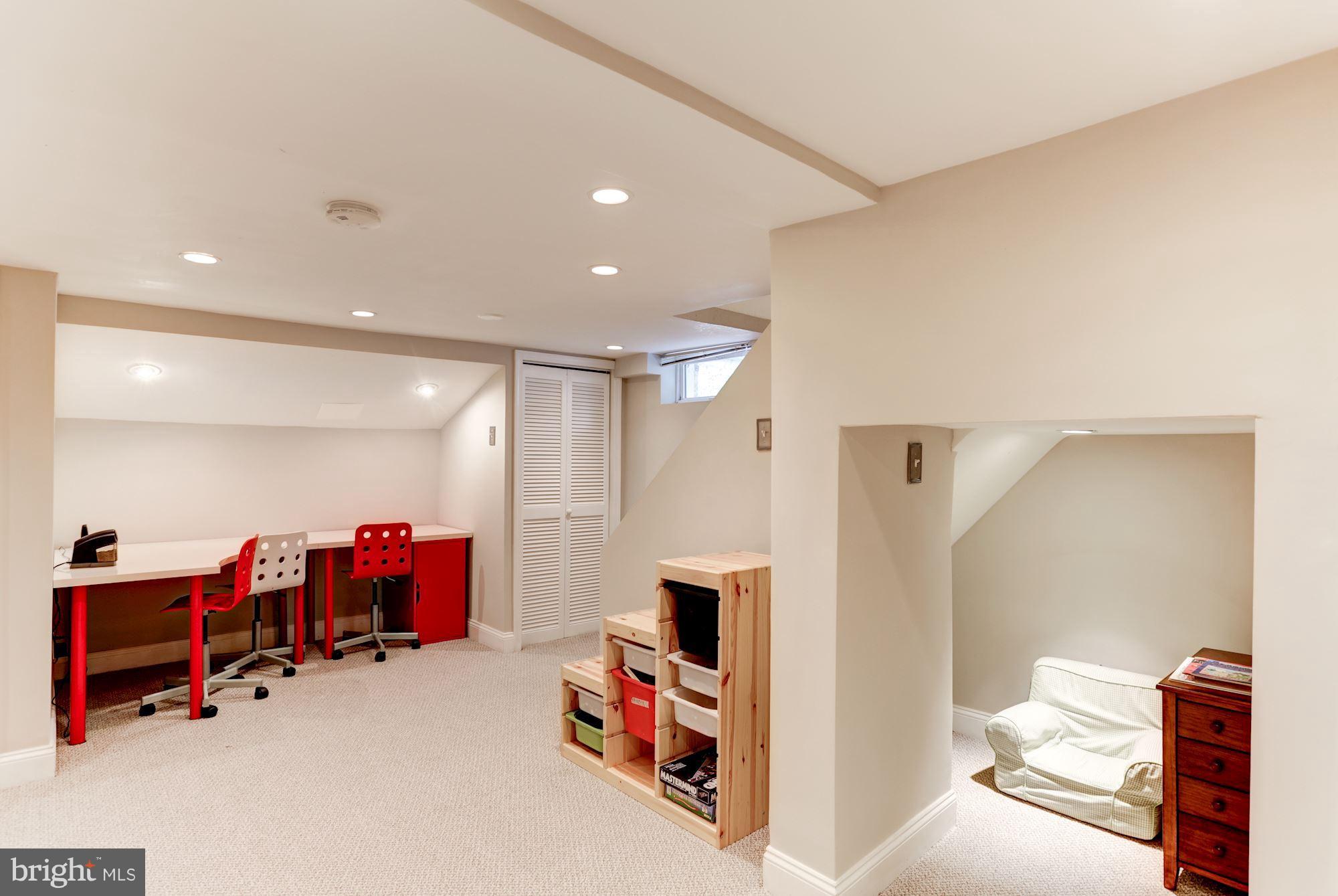 2706 Ridge Rd Drive Alexandria, VA 22302 - Photo 24 of 30 a view of walk in closet with clothes and shoes