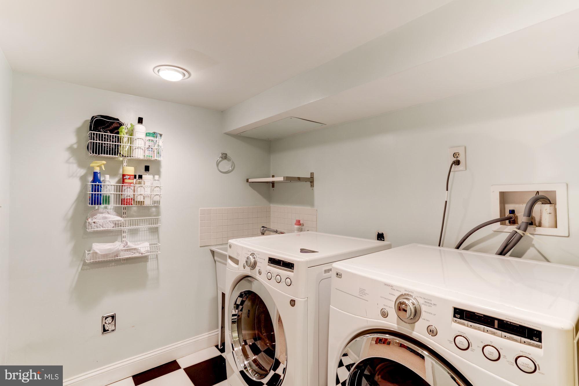 2706 Ridge Rd Drive Alexandria, VA 22302 - Photo 27 of 30 a view of kitchen sink and washer dryer