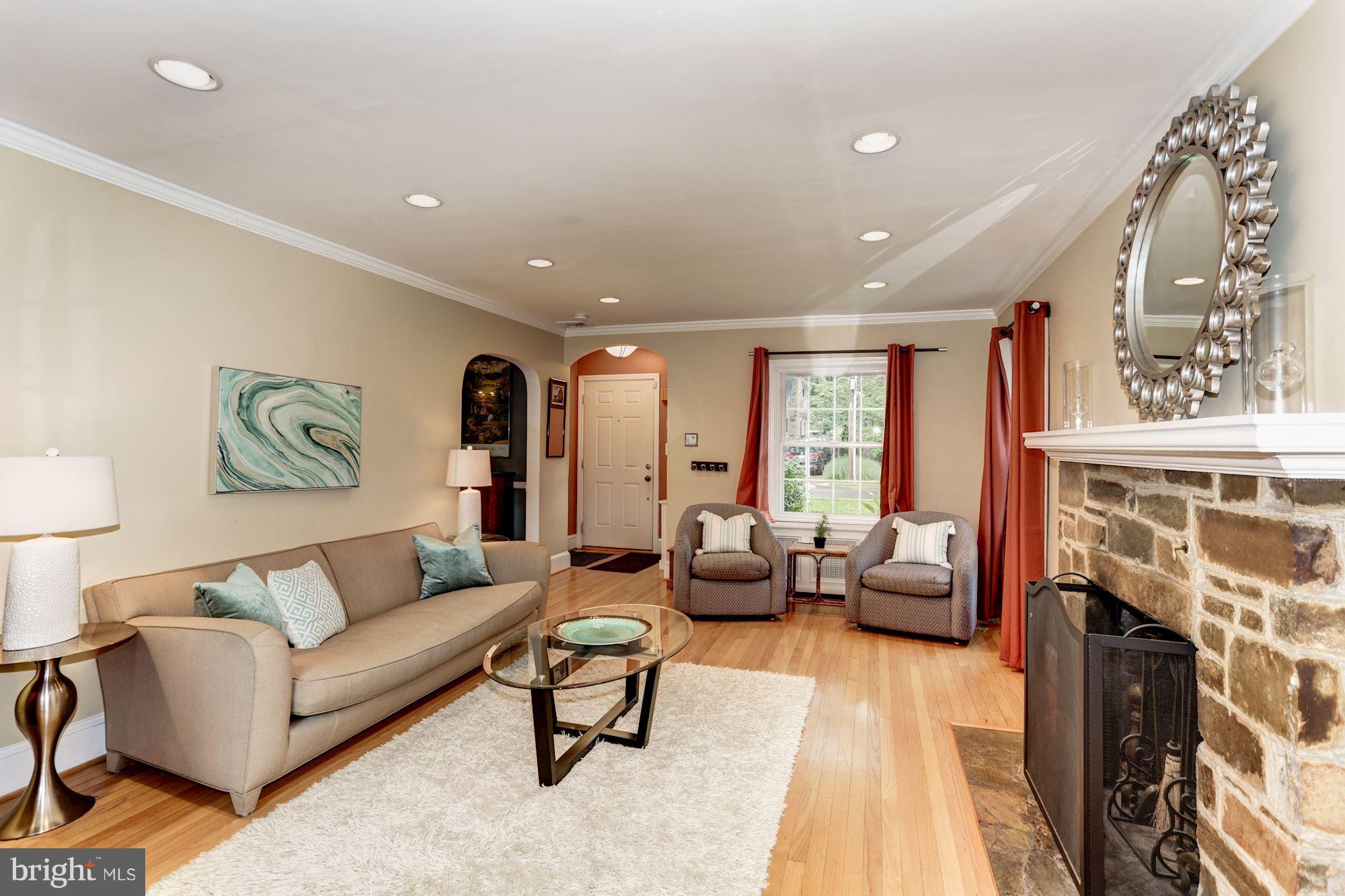 2706 Ridge Rd Drive Alexandria, VA 22302 - Photo 4 of 30 a living room with fireplace furniture and a rug