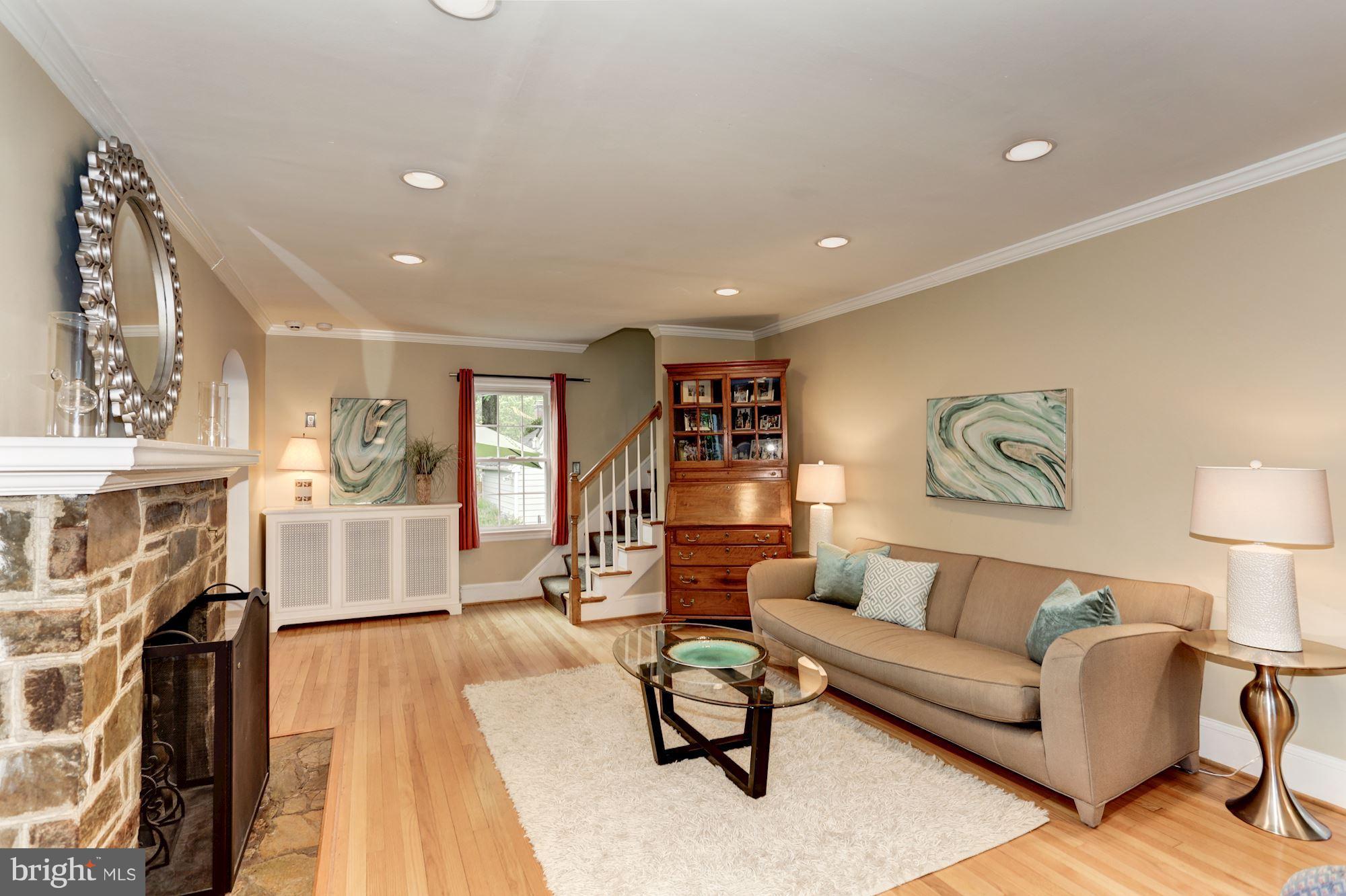2706 Ridge Rd Drive Alexandria, VA 22302 - Photo 5 of 30 a living room with furniture and a fireplace