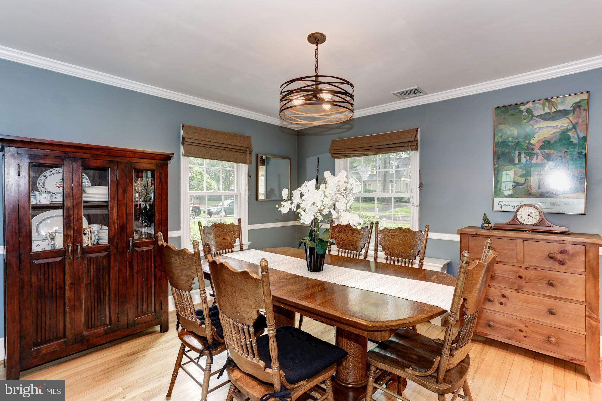 2706 Ridge Rd Drive Alexandria, VA 22302 - Photo 7 of 30 a view of a dining room with furniture wooden floor and chandelier