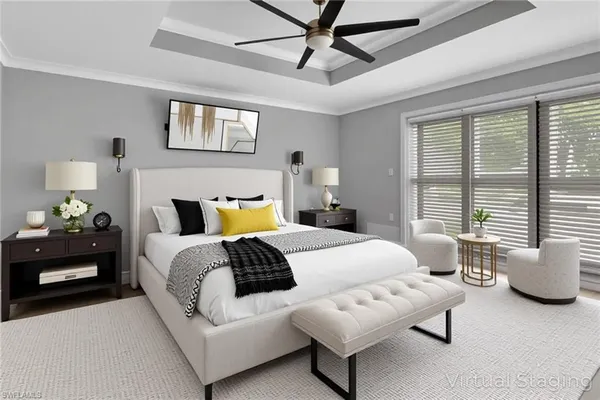 a bedroom with a bed furniture and a window