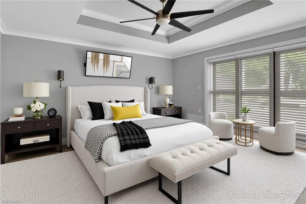 1806 Princess Court Naples, FL 34110 - Photo 20 of 40 a bedroom with a bed furniture and a window