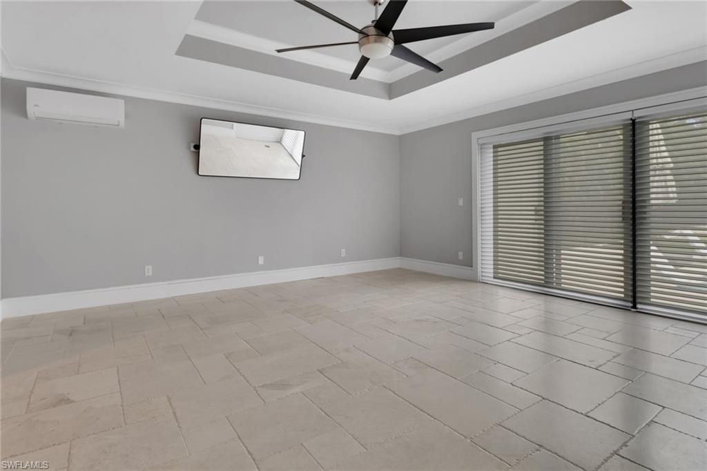 1806 Princess Court Naples, FL 34110 - Photo 21 of 40 a view of an empty room with a window