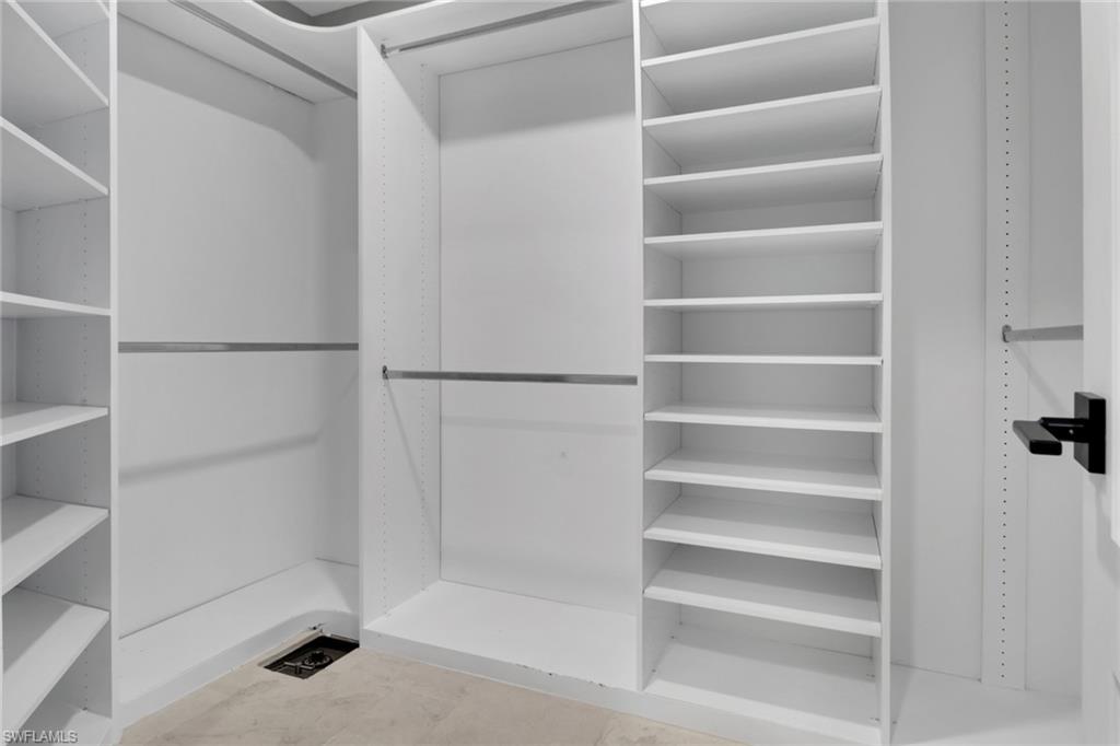 1806 Princess Court Naples, FL 34110 - Photo 23 of 40 a bathroom with a shower