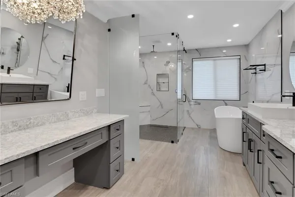 a kitchen with a sink appliances and a counter top space