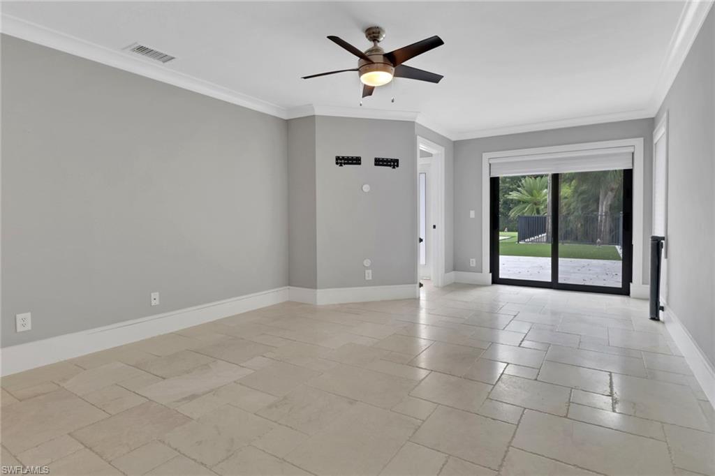 1806 Princess Court Naples, FL 34110 - Photo 29 of 40 a view of an empty room with a window