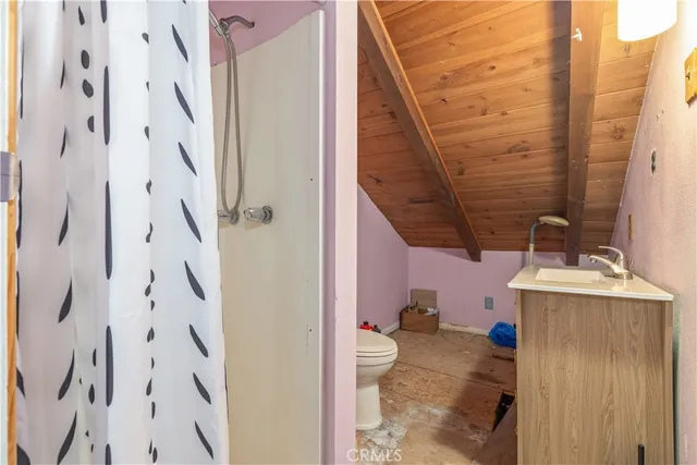 a bathroom with a sink and washing machine