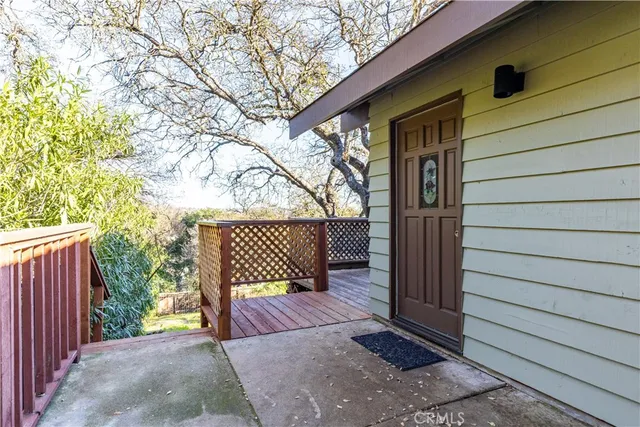 a view of a door and wooden floor