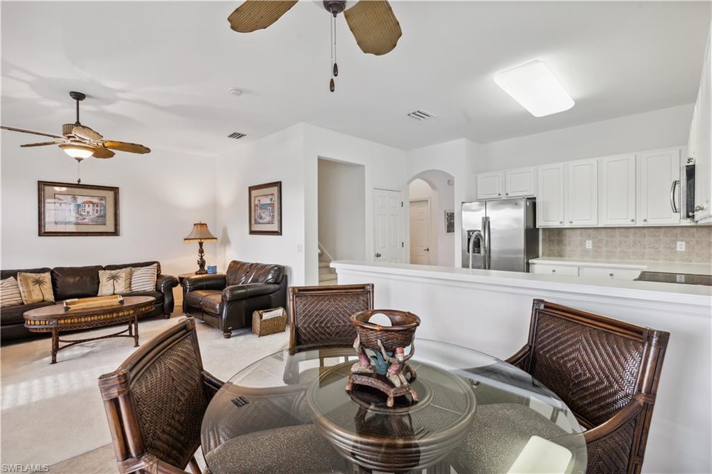 20048 Heatherstone Way, Unit 1 Estero, FL 33928 - Photo 8 of 20 a living room with furniture