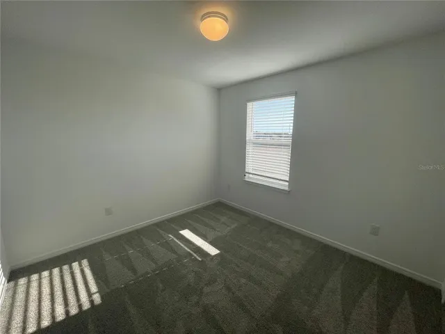 a view of empty room with window