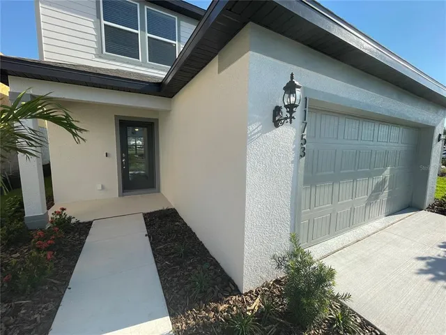 a view of a entryway door of the house