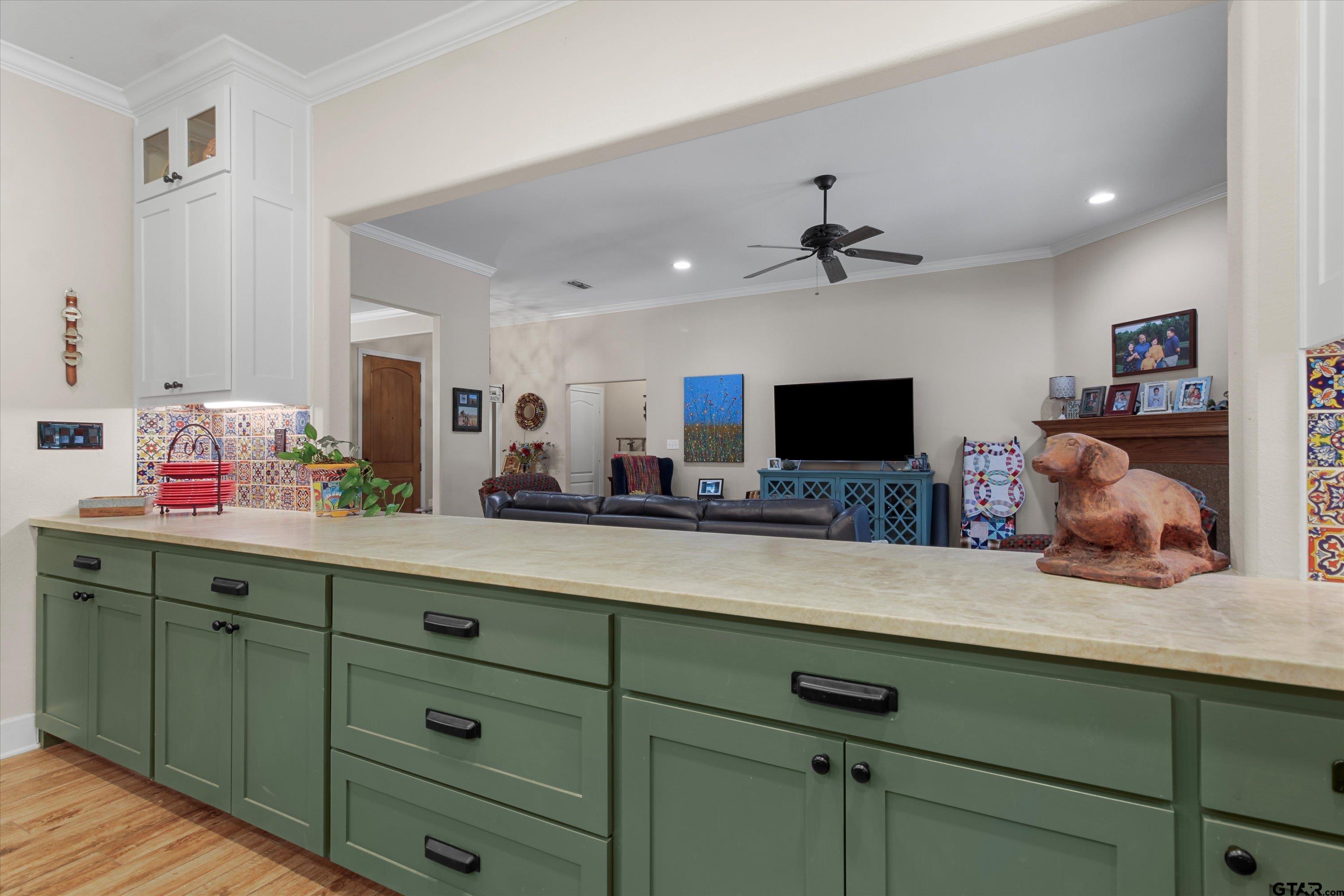 18551 Lazy Lane Flint, TX 75762 - Photo 16 of 45 a living room with hard wood floors and a flat screen tv