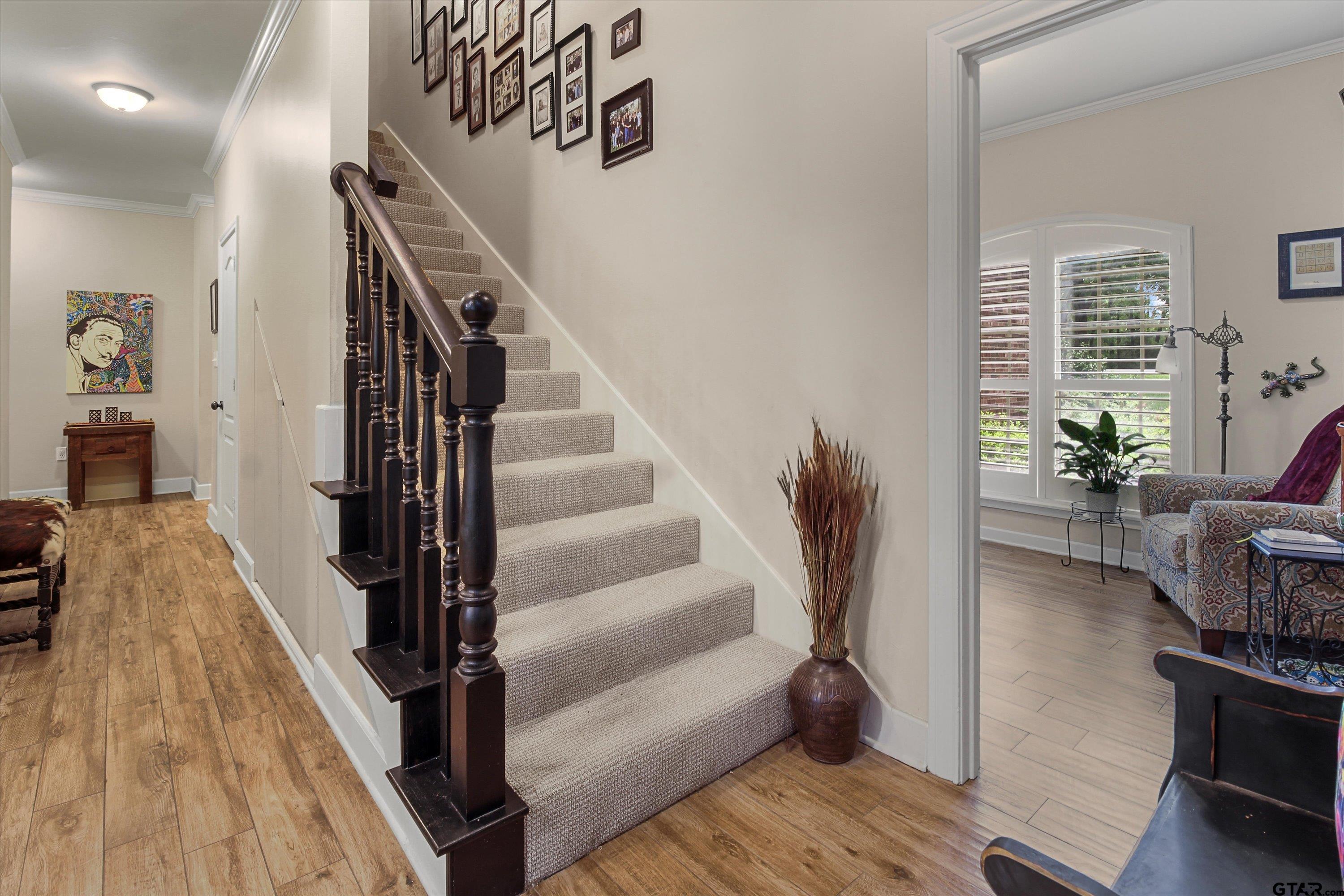 18551 Lazy Lane Flint, TX 75762 - Photo 32 of 45 a view of entryway and hall with wooden floor