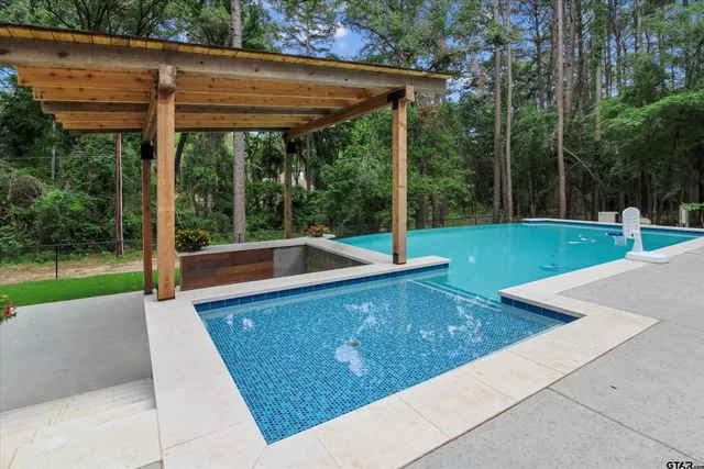 a view of a backyard with a small cabin