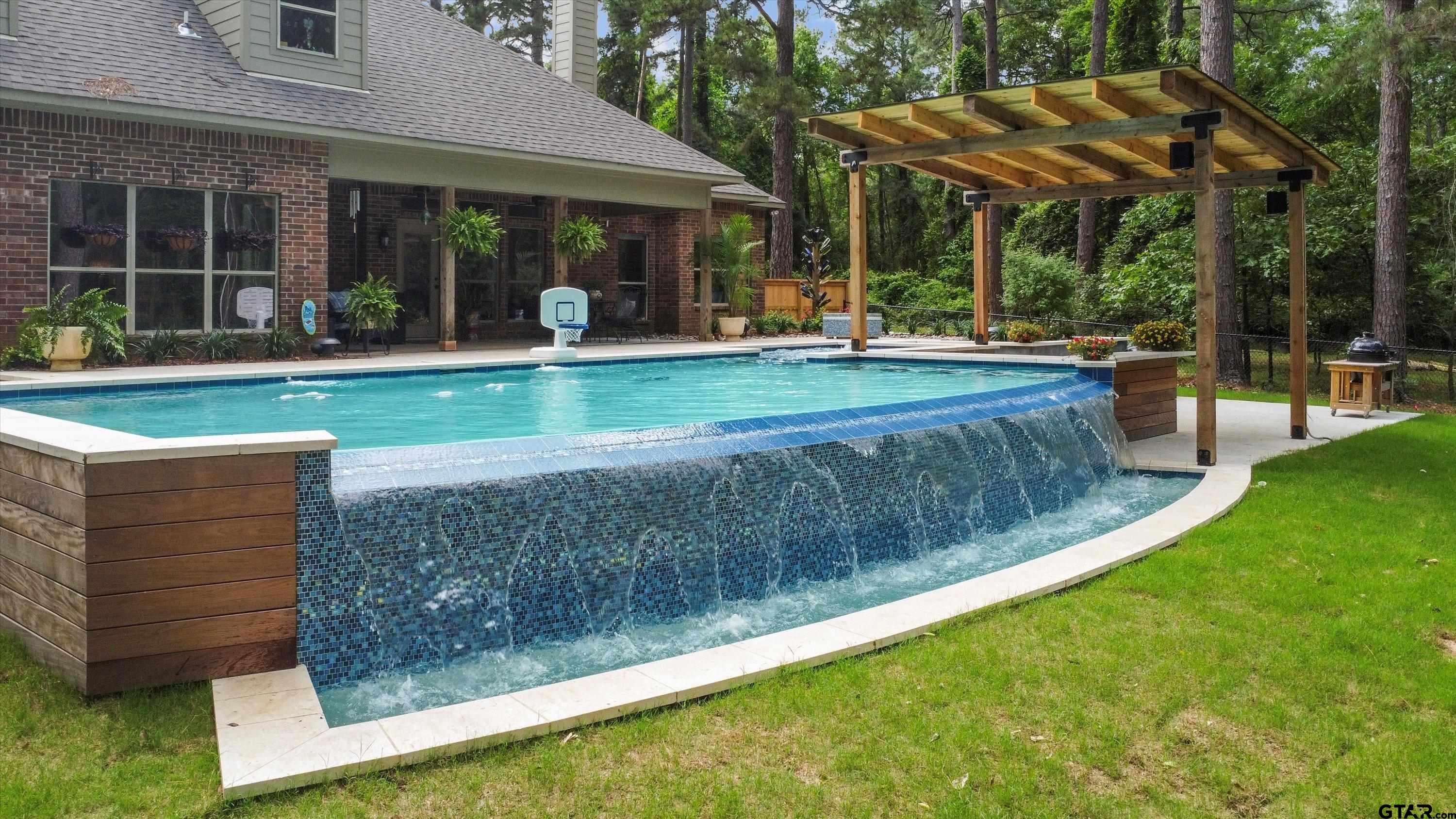 18551 Lazy Lane Flint, TX 75762 - Photo 43 of 45 a view of a house with a yard porch and sitting area