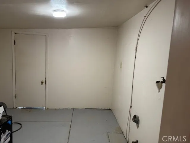 an empty room with a door