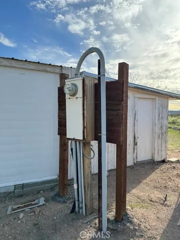 a view of a large building with a mountain in the background