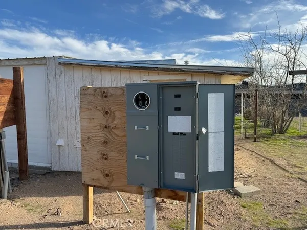 a view of a yard with a mountain